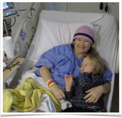 Nicole and Jonah in hospital bed